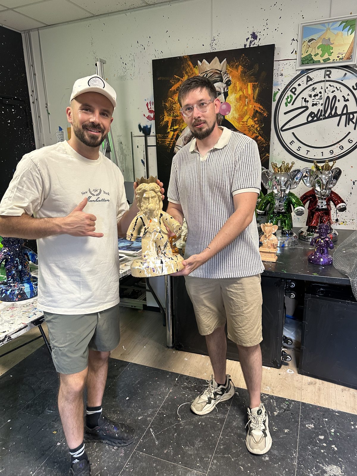 Gagnant avec une sculpture Zeus